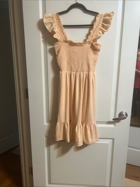Ruffled Smocked Sundress in Pale Peach